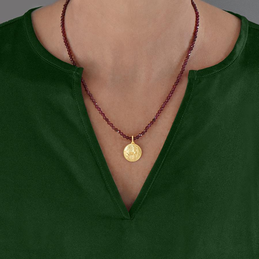 Necklace with Faceted Garnet Beads and Deer Motif Ilias Lalaounis
