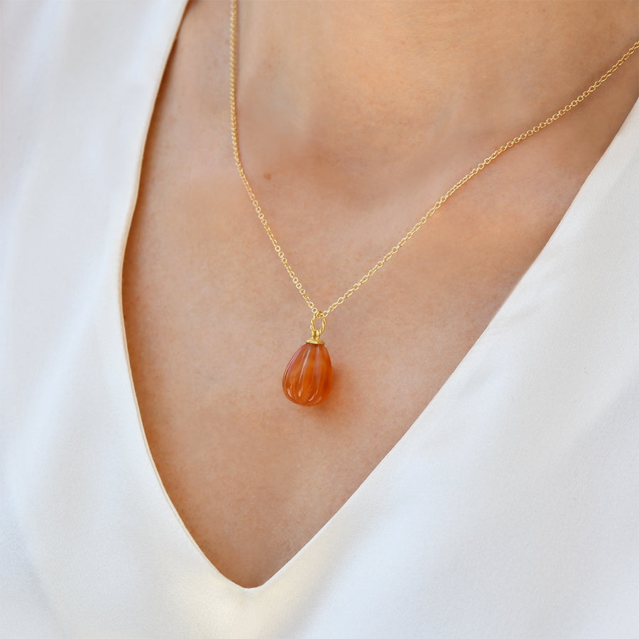 Egg Shaped Carnelian Pendant with Elegant Twisted Bail
